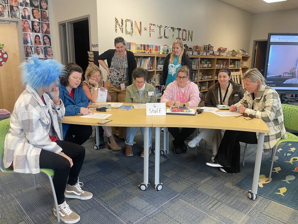 battle of the books students posing with staff 