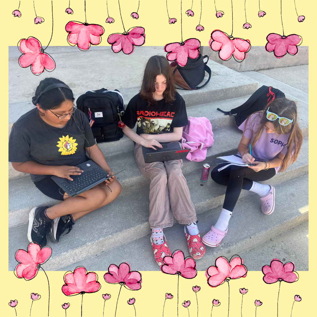 students working on stairs outside with flower graphics