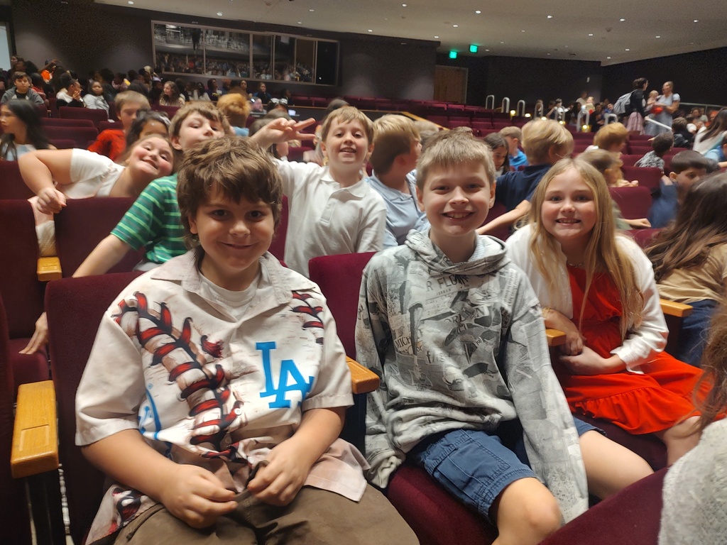 4th graders dressed up at the Wilson Center to watch the NC Symphony