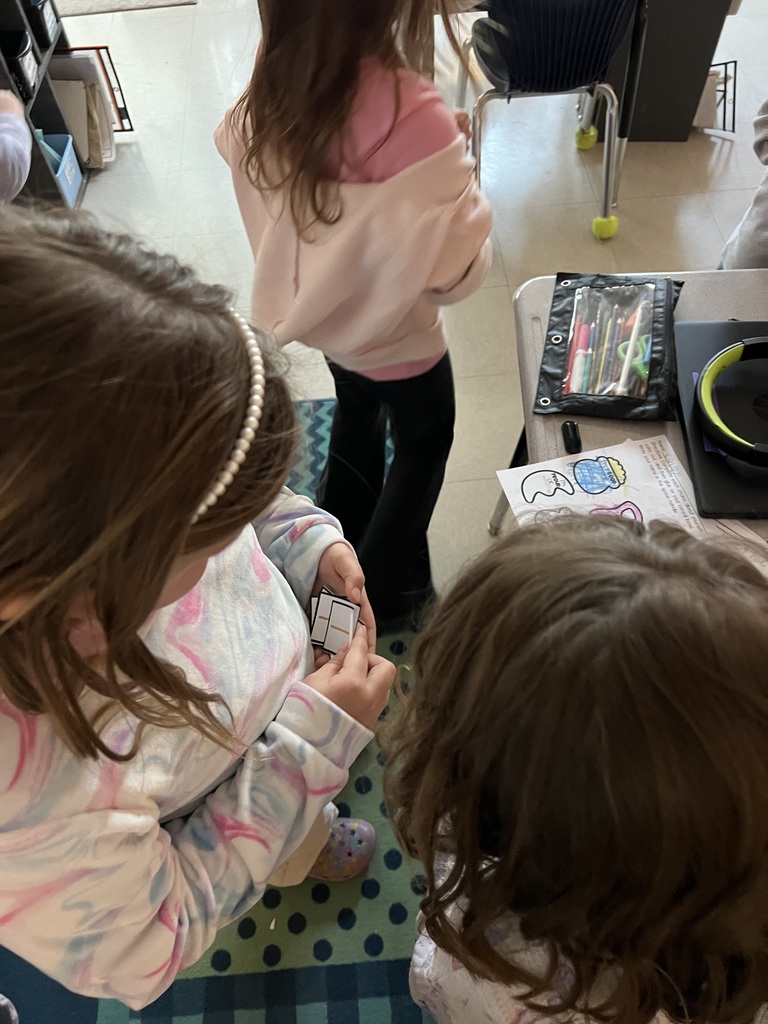 2nd graders playing a group game 