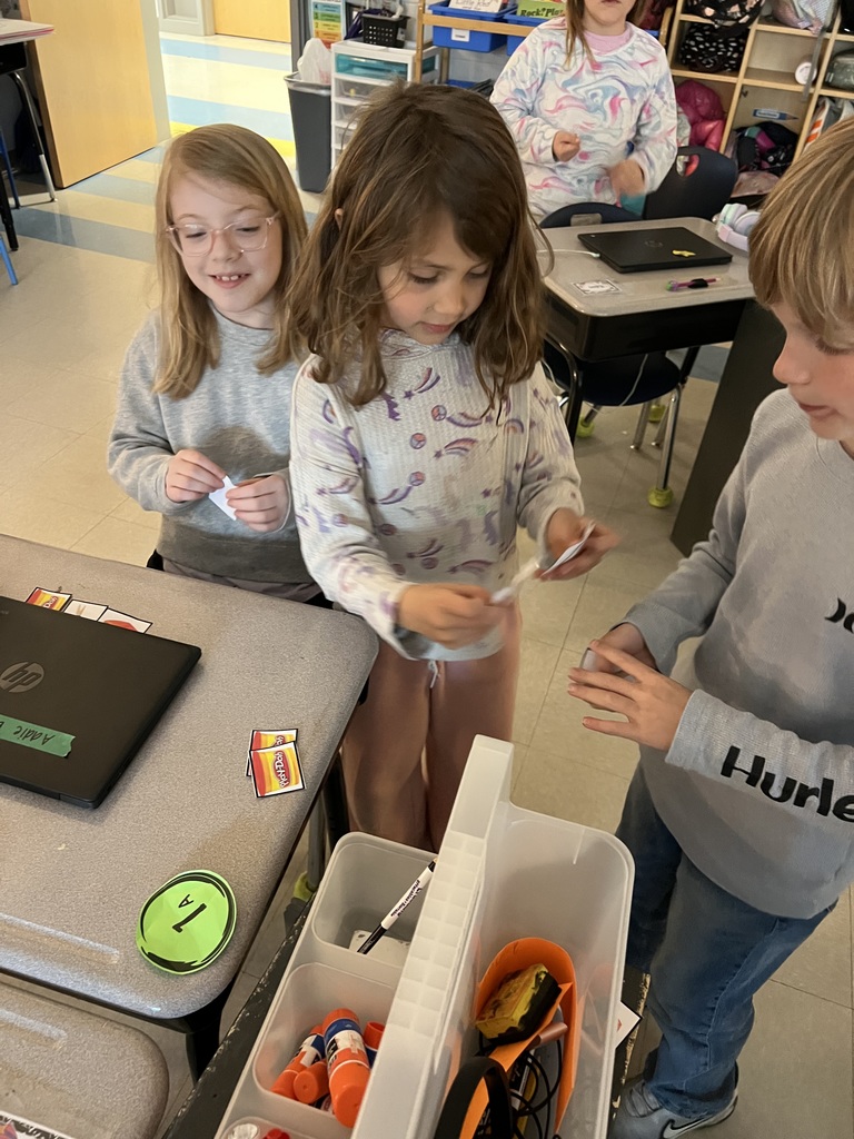 2nd graders playing a group game 