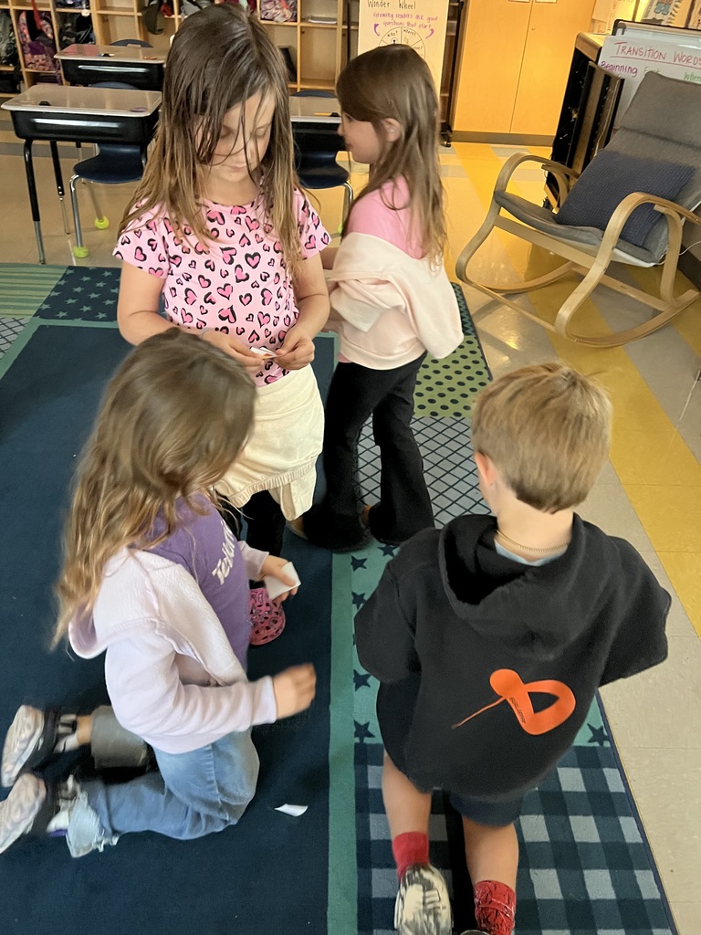2nd graders playing a group game 