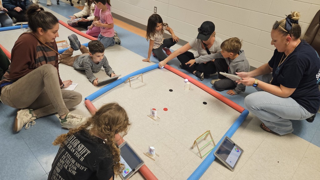 students working on activites at STEAM night