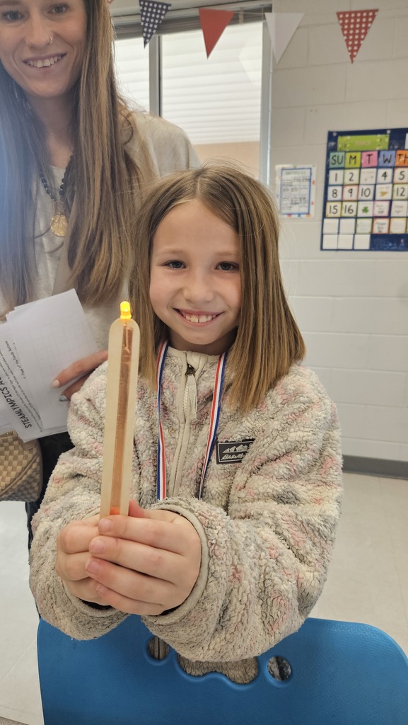 students working on activites at STEAM night