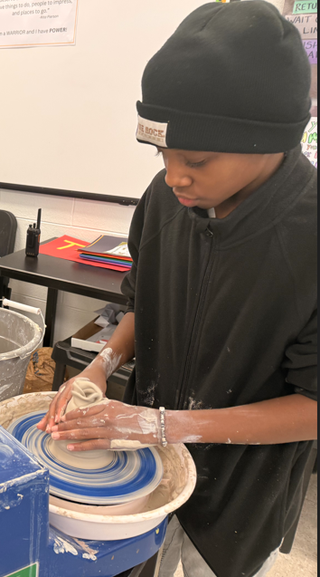 Pottery artists visit 8th grade 