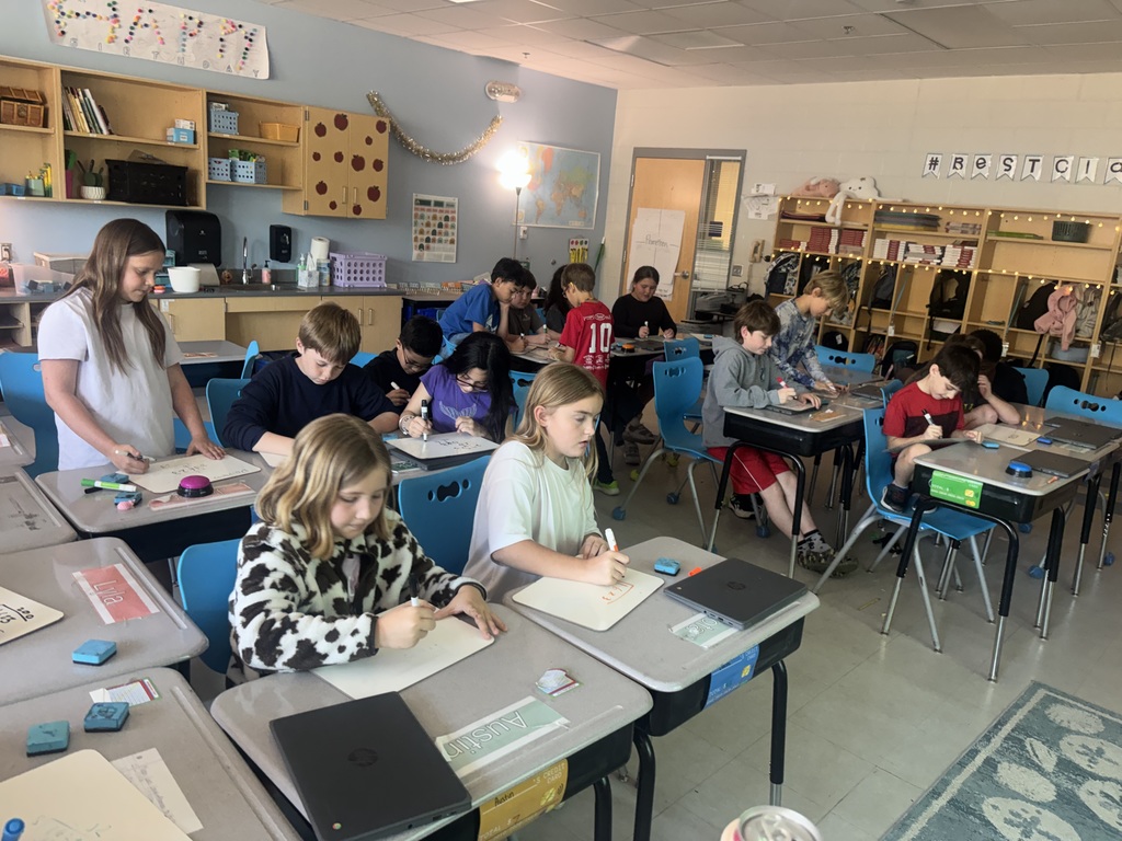 4th grade students playing a math review game