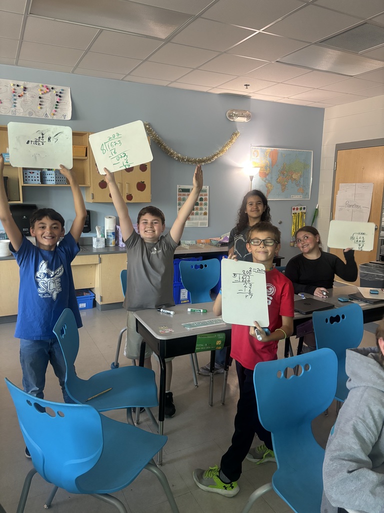 4th grade students playing a math review game