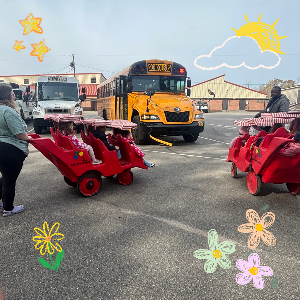 students being shown school bus