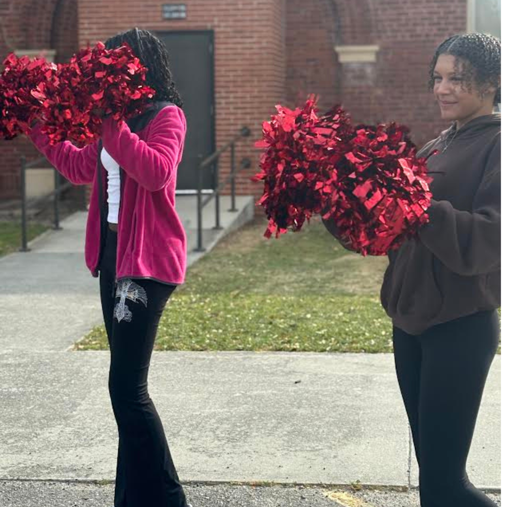 cheerleaders welcoming students