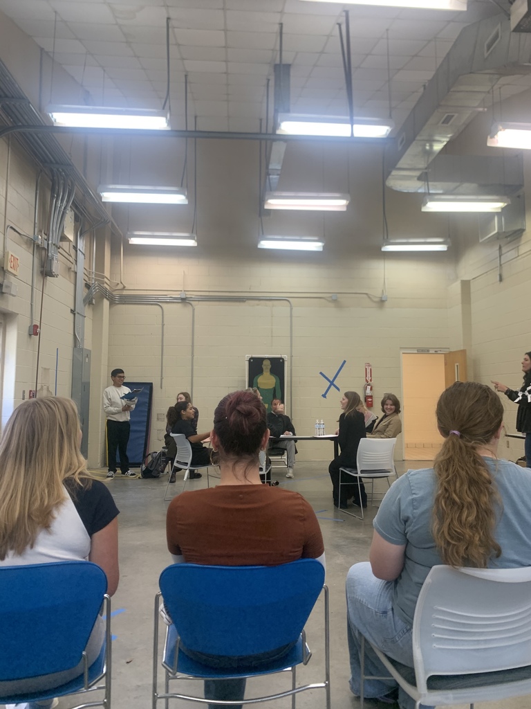 Picture of students sitting down during a mock trial