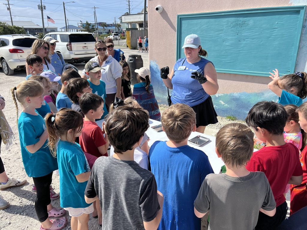 2nd graders on a field trip to the beach with EMA