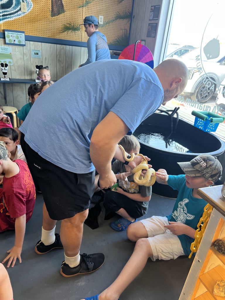 2nd graders on a field trip to the beach with EMA