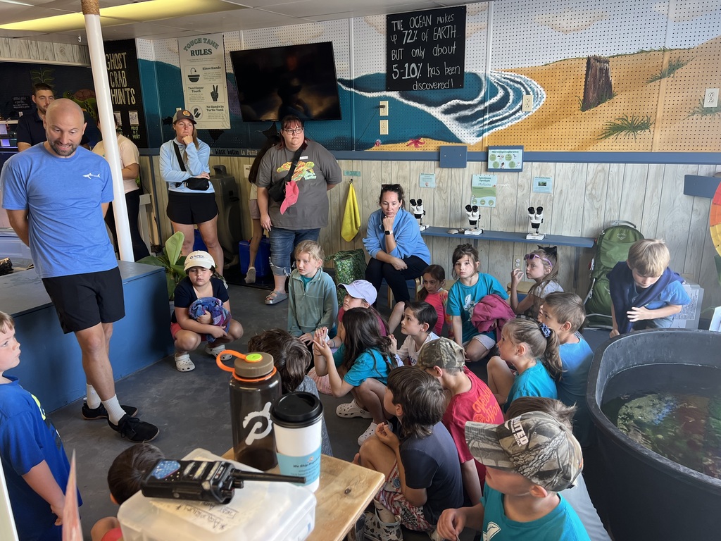 2nd graders on a field trip to the beach with EMA