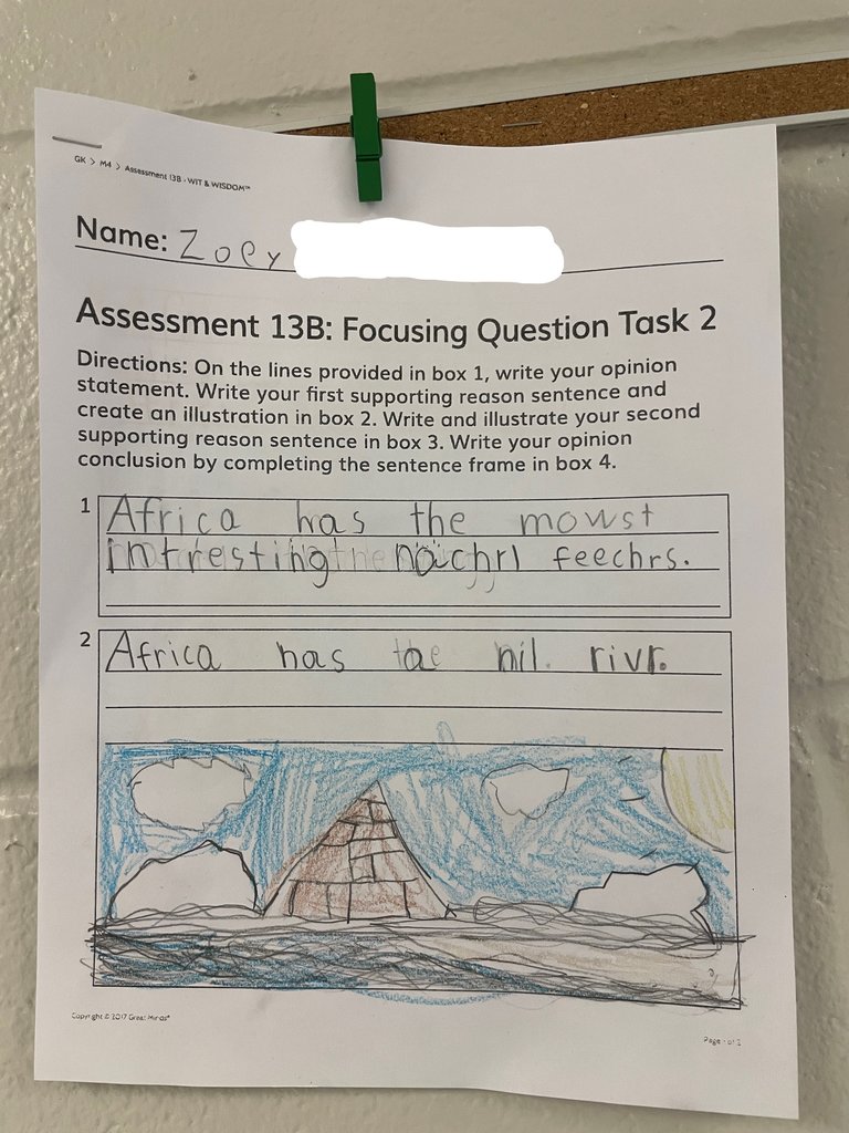 student work hanging in the hallway