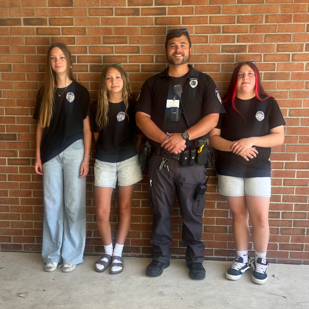 students posing with sro