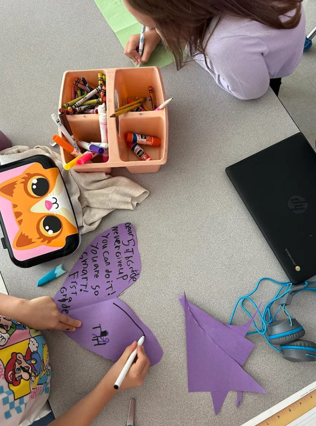 first graders writing cards