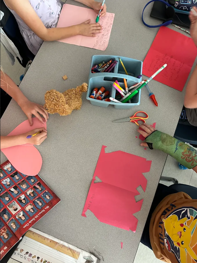 first graders writing cards