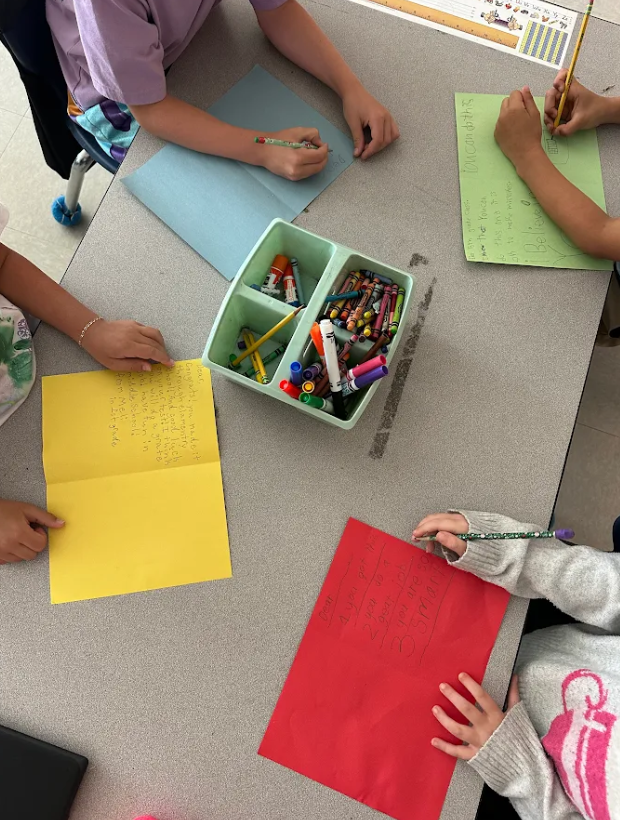 first graders writing cards