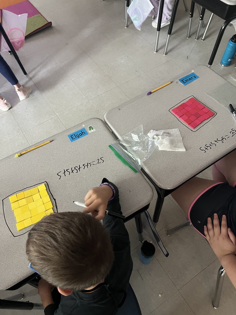 2nd graders making arrays with square tiles