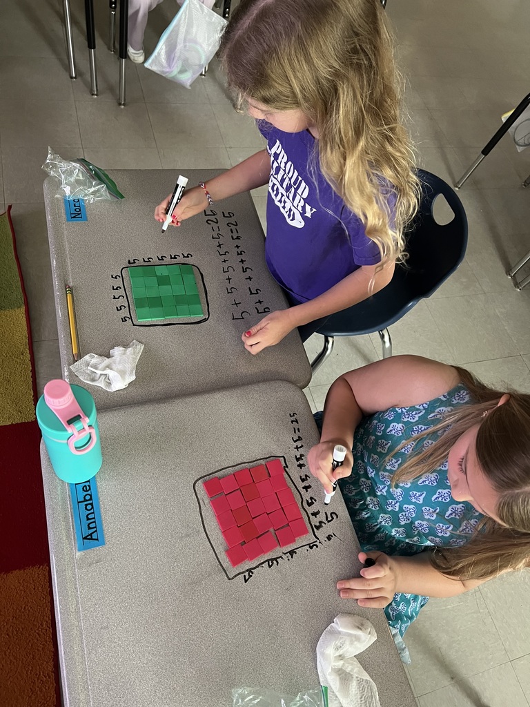 2nd graders making arrays with square tiles
