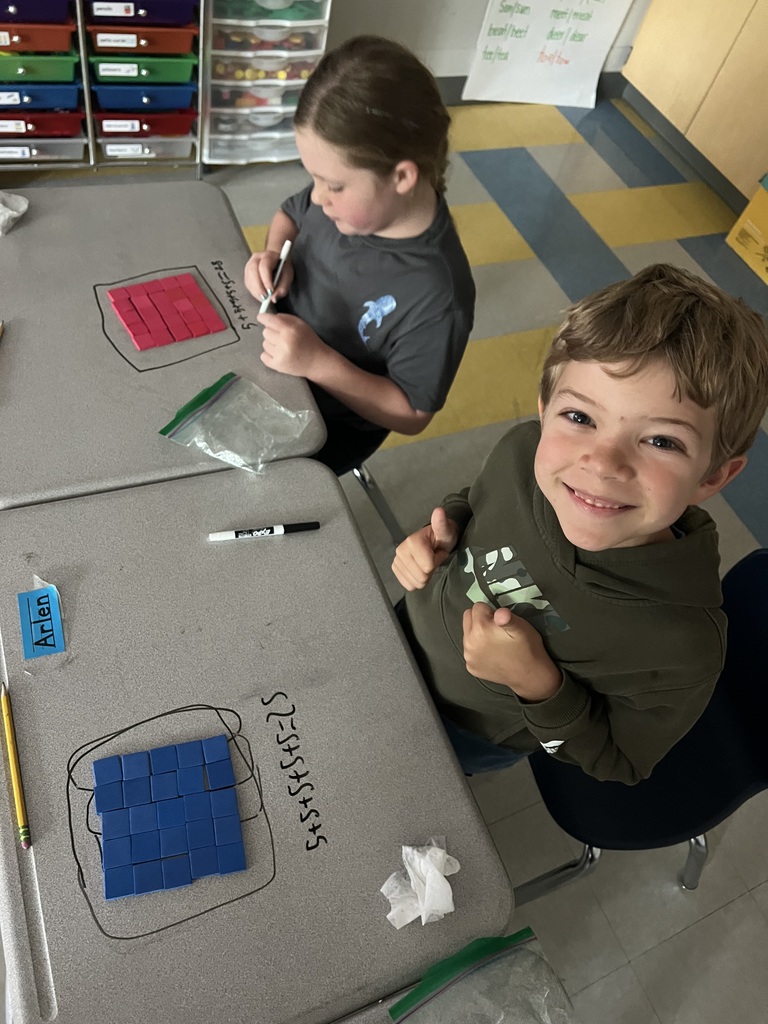 2nd graders making arrays with square tiles