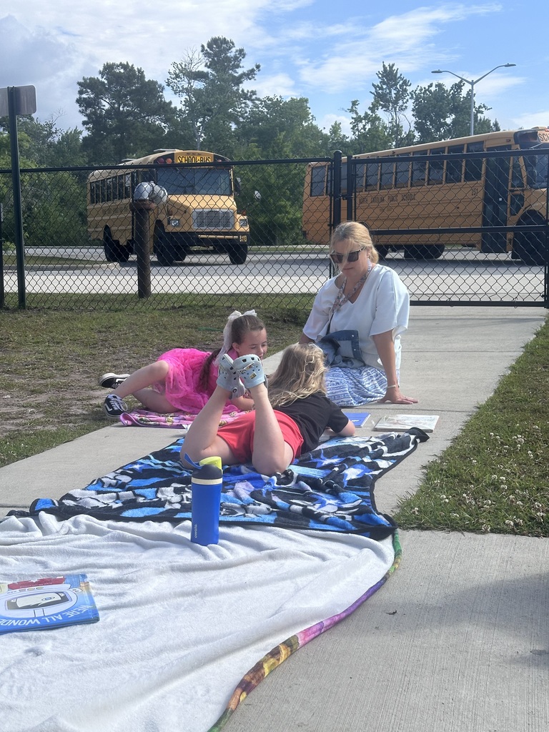 prek students reading outside