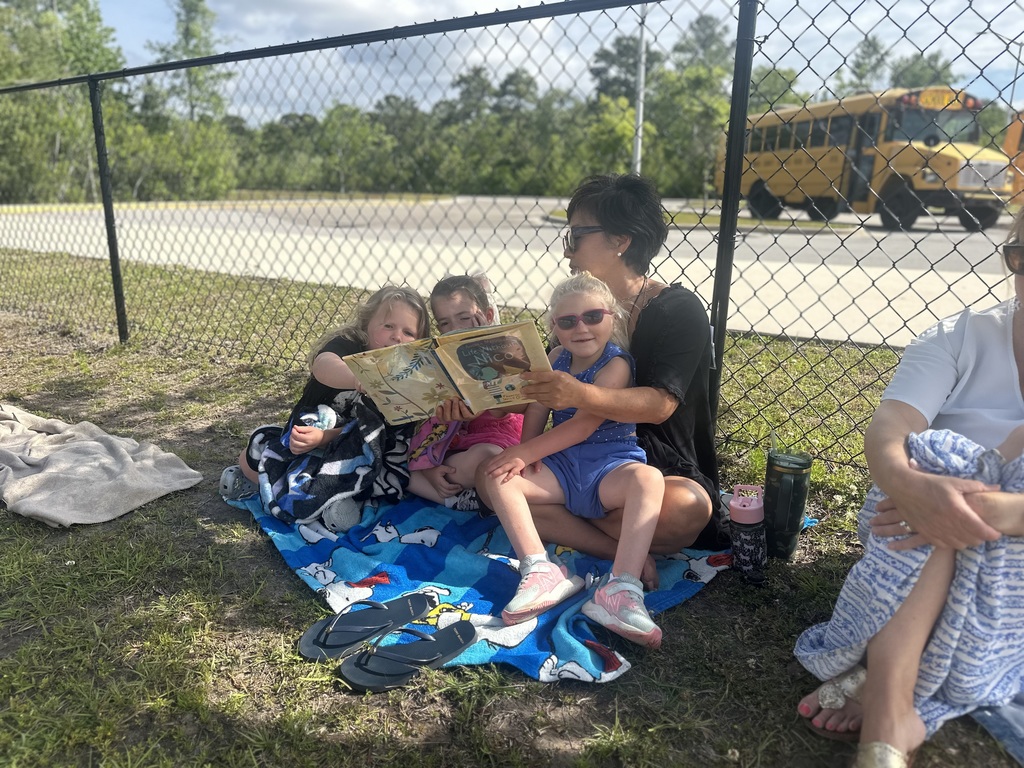 prek students reading outside