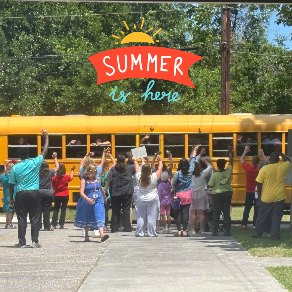 teachers waving goodbye to students