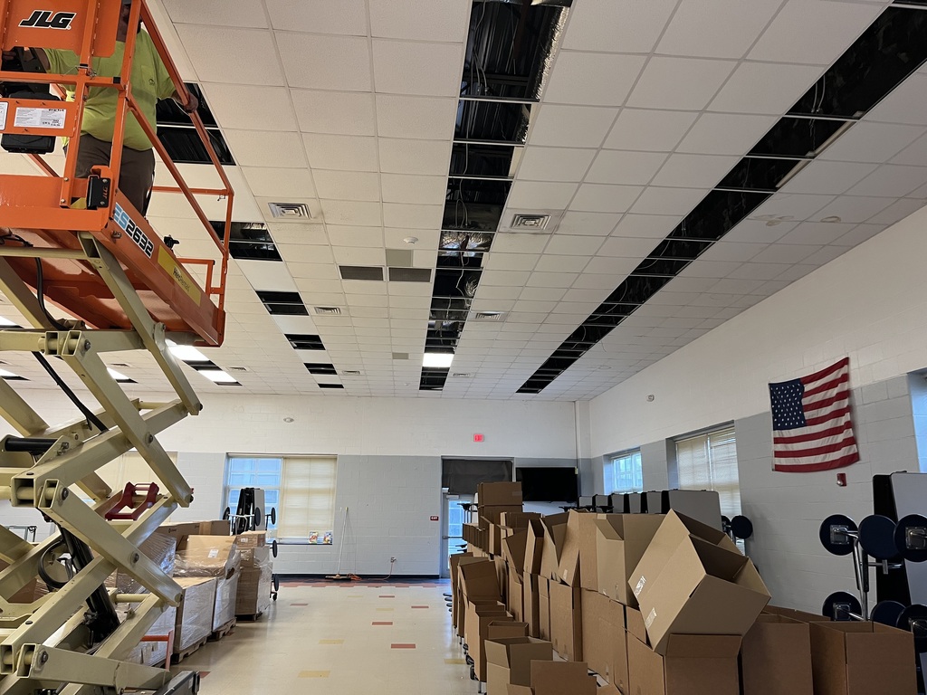 C.F. Pope lighting work in the cafeteria