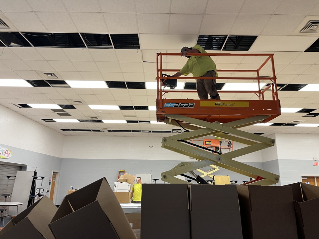 C.F. Pope lighting work in the cafeteria