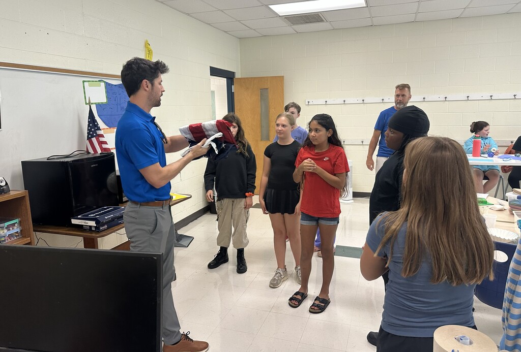 Special thanks to John Gilbert of Woodmen of the World Insurance Society for his generous gift of a new flag to Cape Fear Middle School. We're so grateful for your thoughtfulness and support of our school community!