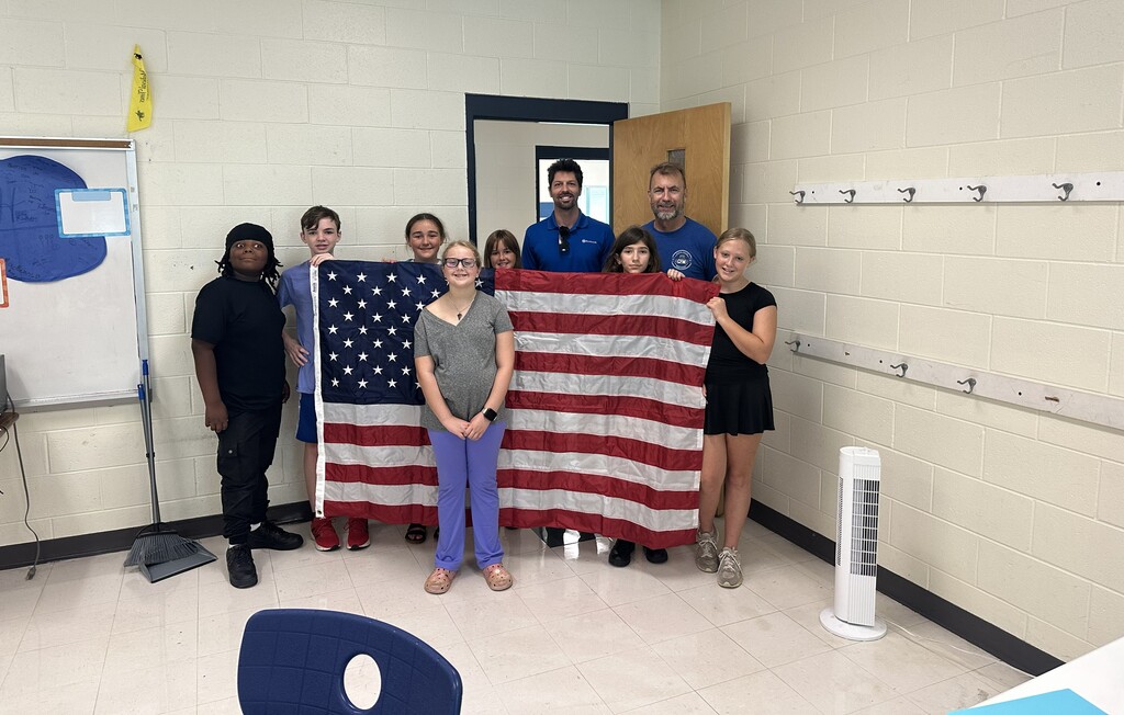 Special thanks to John Gilbert of Woodmen of the World Insurance Society for his generous gift of a new flag to Cape Fear Middle School. We're so grateful for your thoughtfulness and support of our school community!