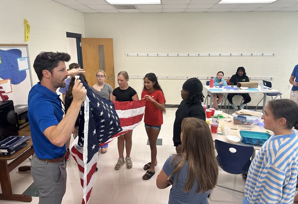 Special thanks to John Gilbert of Woodmen of the World Insurance Society for his generous gift of a new flag to Cape Fear Middle School. We're so grateful for your thoughtfulness and support of our school community!