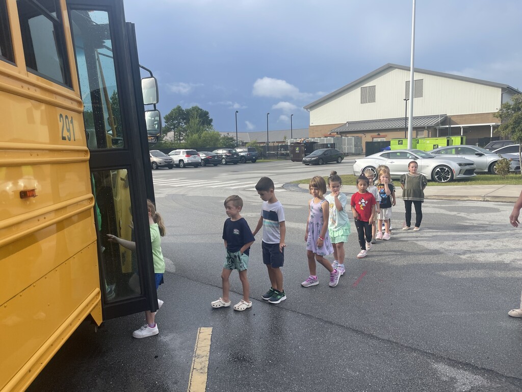 students at a bus evacuation drill