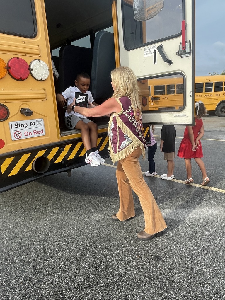 students at a bus evacuation drill