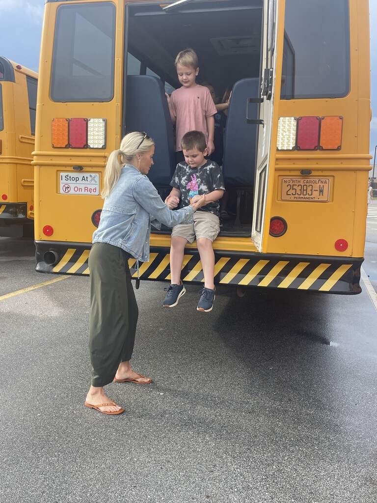 students at a bus evacuation drill