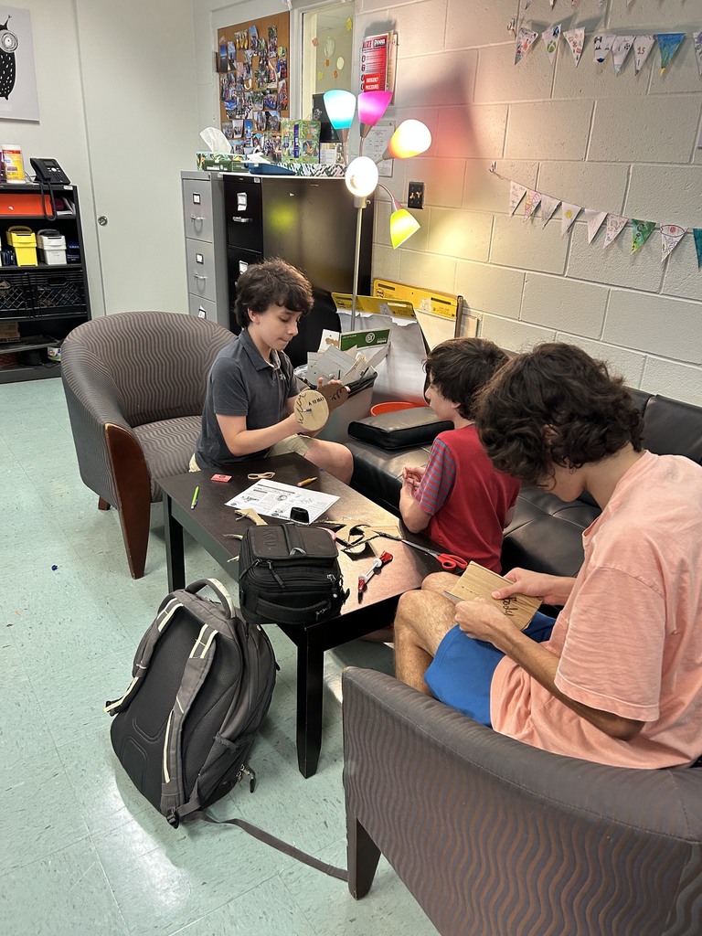 Students work in a group to design a rover to race