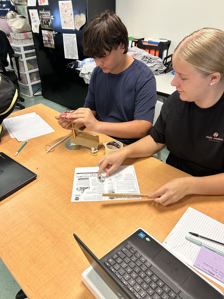 Students build rover for science class