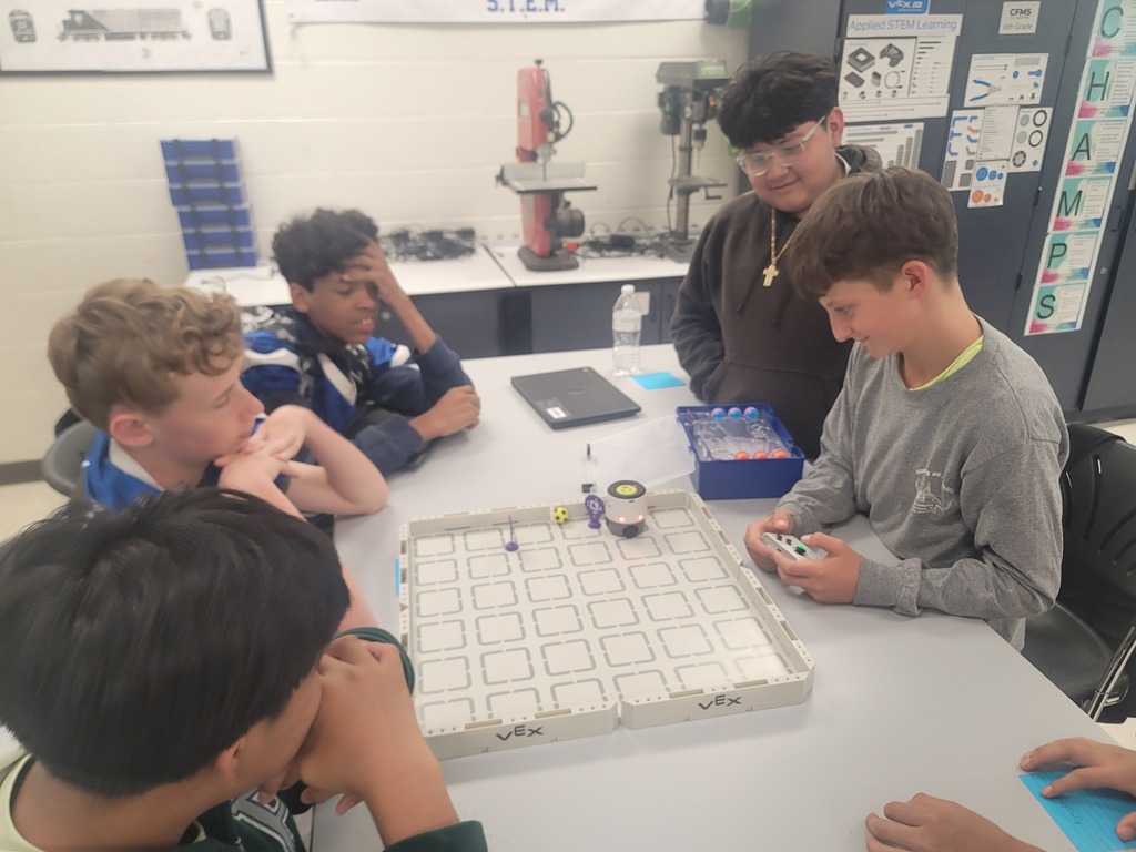 Robotics students here at CFMS getting their first chance to operate their new Vex AIM bots! They are playing soccer to learn the basic controls, before moving on to coding them.