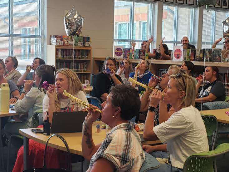 staff celebrating success