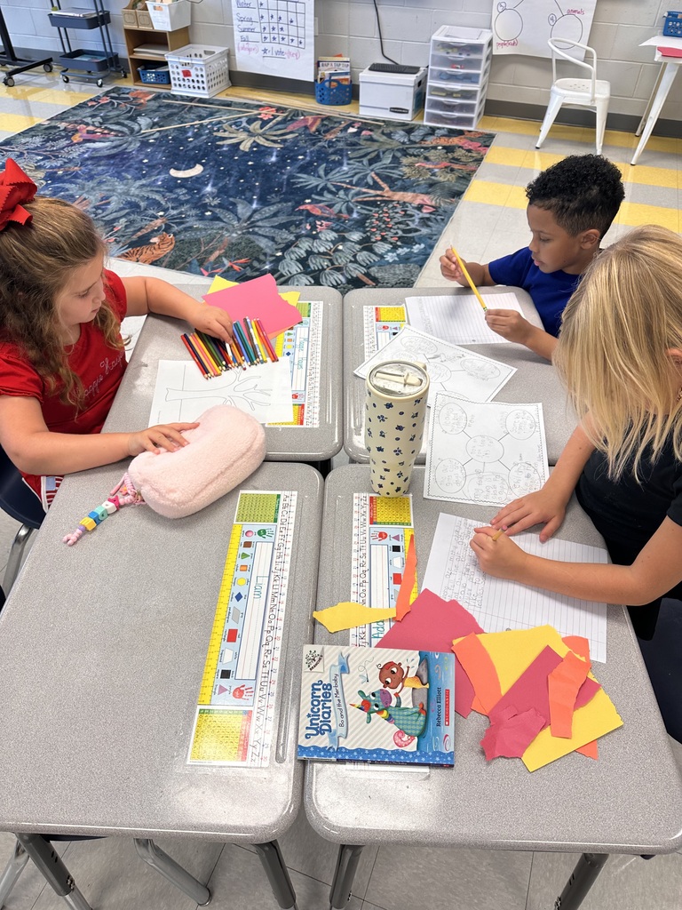 2nd grade students working at their tables