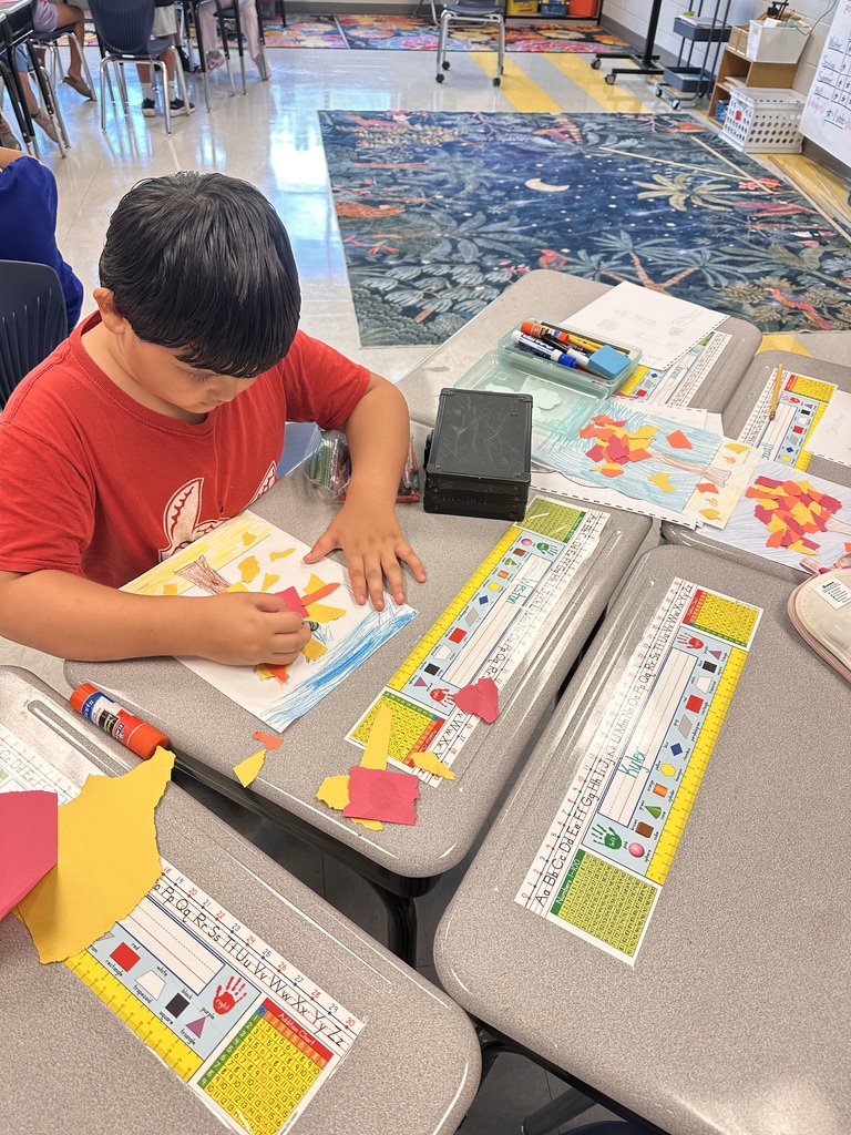 2nd grade students working at their tables