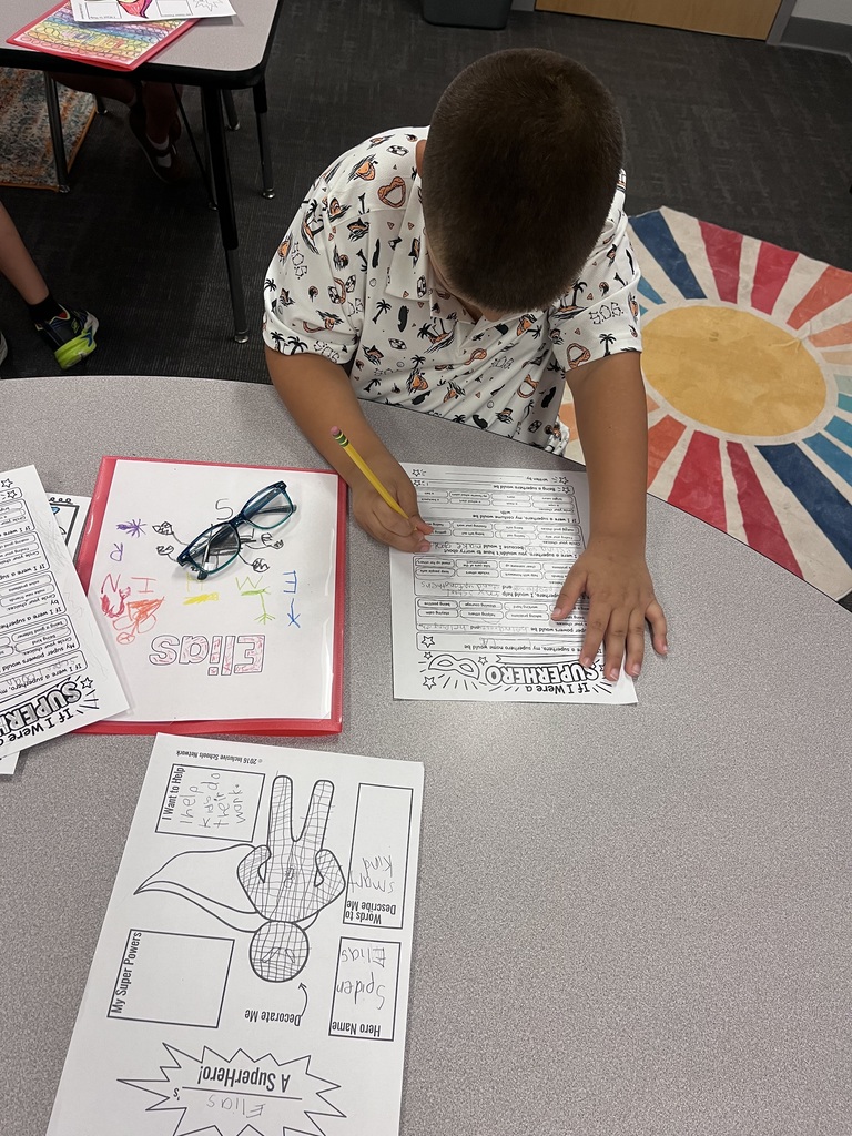 students working on a super hero project
