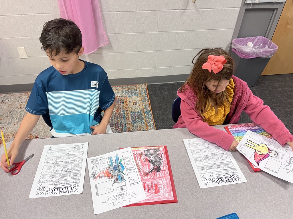 students working on a super hero project