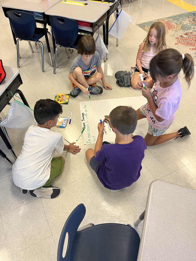 2nd graders collaboratively writing