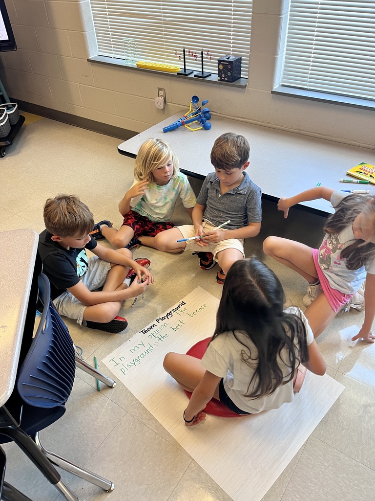 2nd graders collaboratively writing