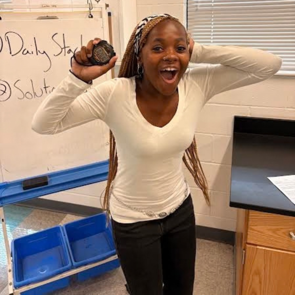 student in science class