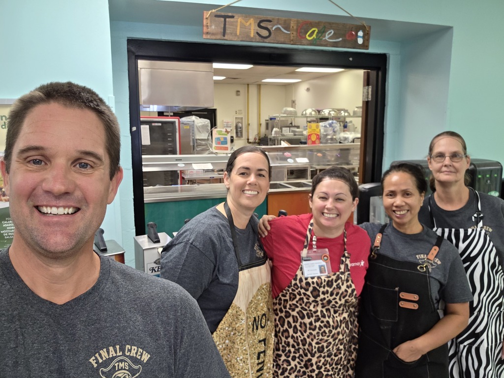 Principal McNaughton  with Topsail Middle School kitchen staff 
