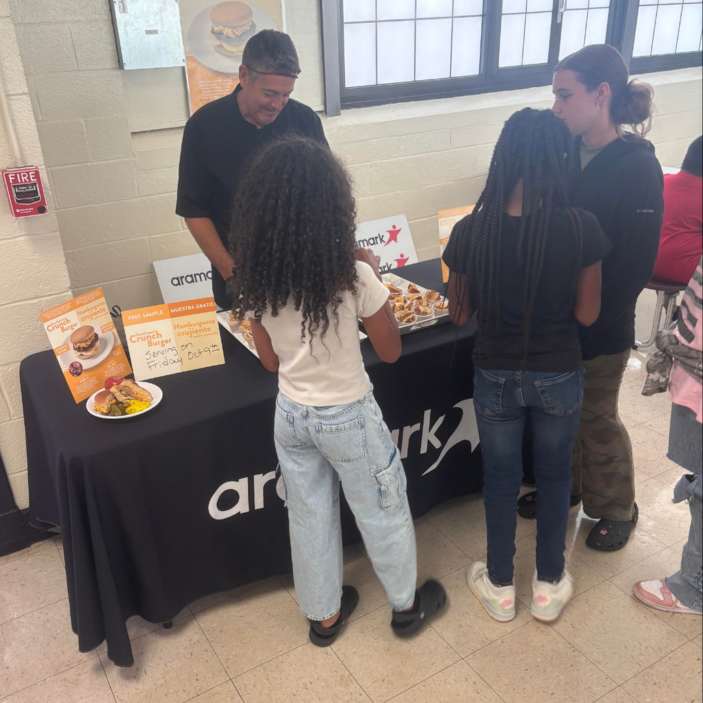 students sampling lunch in cafeteria