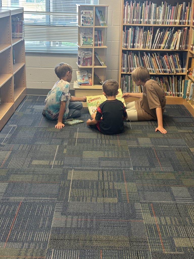 older students reading to younger students